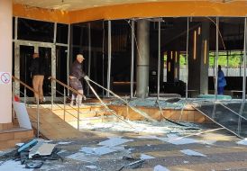 Completely shattered glass windows and doors in a building after a combined attack in the Shevchenkivskyi district of Kyiv