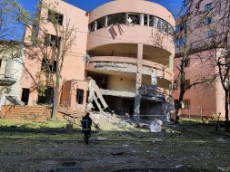 A half-destroyed building with broken windows after a combined attack in the Shevchenkivskyi district of Kyiv
