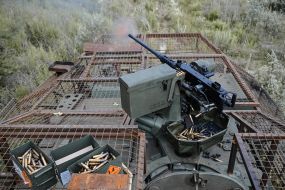 Paratroopers train in driving and firing from the Stryker armored personnel carrier at the training ground