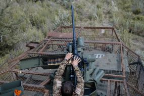 Paratroopers train in driving and firing from the Stryker armored personnel carrier at the training ground