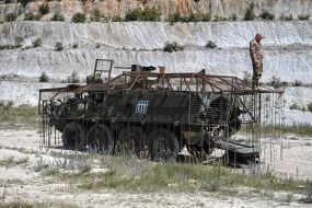 Paratroopers train in driving and firing from the Stryker armored personnel carrier at the training ground
