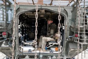 Paratroopers train in driving and firing from the Stryker armored personnel carrier at the training ground