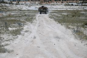 Paratroopers train in driving and firing from the Stryker armored personnel carrier at the training ground