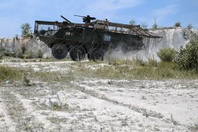 Paratroopers train in driving and firing from the Stryker armored personnel carrier at the training ground