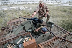 Paratroopers train in driving and firing from the Stryker armored personnel carrier at the training ground