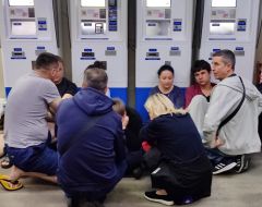 People hide at a light rail stop during a night-time mass attack in the Sviatoshynskyi district of Kyiv