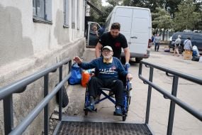 Borys Melnyk at a special center for refugees and displaced persons in the city of Pavlohrad