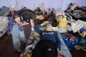 Borys Melnyk at a special center for refugees and displaced persons in the city of Pavlohrad