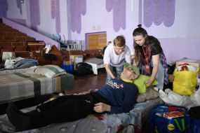 Borys Melnyk at a special center for refugees and displaced persons in the city of Pavlohrad