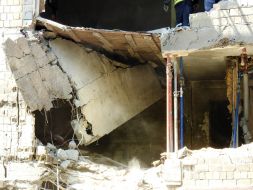 The destroyed wall of a residential building at the site of a Russian drone strike in the Svyatoshynskyi district of Kyiv