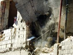 The destroyed wall of a residential building at the site of a Russian drone strike in the Svyatoshynskyi district of Kyiv