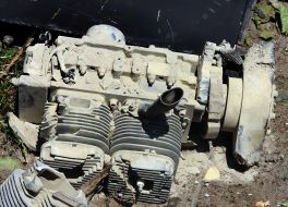 The engine of a Russian drone lies on the lawn after a massive nighttime attack in the Svyatoshynskyi district of Kyiv