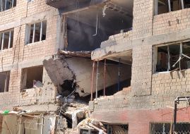 The destroyed wall of a residential building at the site of a Russian drone strike in the Svyatoshynskyi district of Kyiv