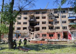 The destroyed wall of a residential building at the site of a Russian drone strike in the Svyatoshynskyi district of Kyiv