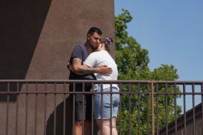 A man hugs a woman after Russian shelling of Kharkiv