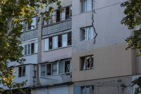 Part of a residential building in Odessa damaged after being hit by a drone