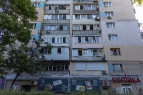 Part of a residential building in Odessa damaged after being hit by a drone