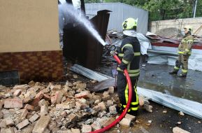 Rescuers are putting out the fire