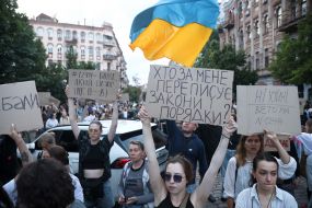 Participants in a protest against the Verkhovna Rada's adoption of a bill restricting the powers of the National Anti-Corruption Bureau and the Specialized Anti-Corruption Prosecutor's Office