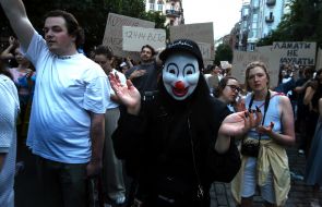 Participants in a protest against the Verkhovna Rada's adoption of a bill restricting the powers of the National Anti-Corruption Bureau and the Specialized Anti-Corruption Prosecutor's Office