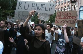 Participants in a protest against the Verkhovna Rada's adoption of a bill restricting the powers of the National Anti-Corruption Bureau and the Specialized Anti-Corruption Prosecutor's Office