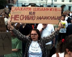 Participants in a protest against the Verkhovna Rada's adoption of a bill restricting the powers of the National Anti-Corruption Bureau and the Specialized Anti-Corruption Prosecutor's Office