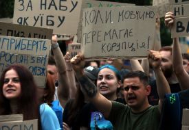 Participants in a protest against the Verkhovna Rada's adoption of a bill restricting the powers of the National Anti-Corruption Bureau and the Specialized Anti-Corruption Prosecutor's Office