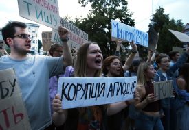 Participants in a protest against the Verkhovna Rada's adoption of a bill restricting the powers of the National Anti-Corruption Bureau and the Specialized Anti-Corruption Prosecutor's Office