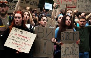 Participants in a protest against the Verkhovna Rada's adoption of a bill restricting the powers of the National Anti-Corruption Bureau and the Specialized Anti-Corruption Prosecutor's Office