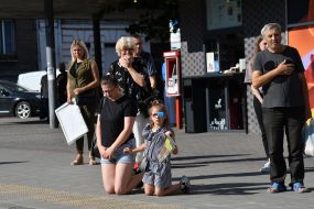 People honor the memory of fallen servicemen of the Airborne Assault Troops of the Armed Forces of Ukraine on a street in Lviv
