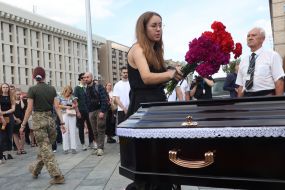 Flowers with yellow and blue ribbon