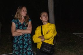 People near the house hit by a Russian drone