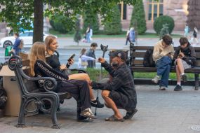 A man talks to girls