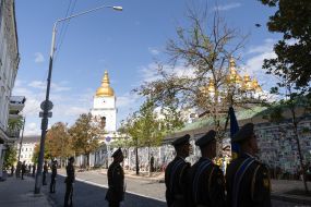 Laying flowers at the Wall of Remembrance