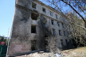 Broken windows in a house after nighttime shelling in the Shevchenkivskyi district of Kyiv