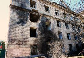 Broken windows in a house after nighttime shelling in the Shevchenkivskyi district of Kyiv