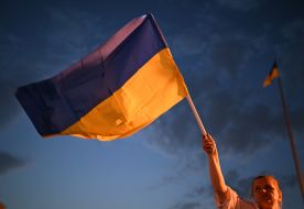 A woman with a Ukrainian flag