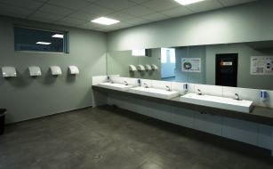 Hand sinks at the entrance to the school cafeteria