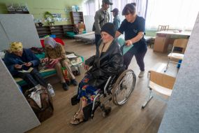 Refugees at the Lozova transit center in the city of Lozova, Kharkiv region