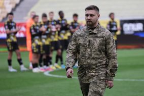 A soldier entered the field to take a symbolic kick at the ball