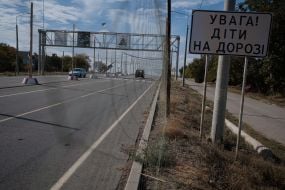 Anti-drone nets over a road in Kherson