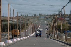 Anti-drone nets over a road in Kherson