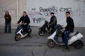 Teenagers on mopeds in Kherson