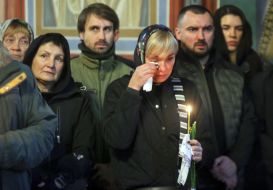 Церемония прощания с погибшими журналисткой и оператором телеканала FreeДом Еленой Губановой и Евгением Кармазиным в Киеве