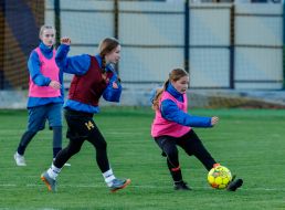 Young female football players