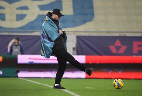 A soldier from the 501st Marine Battalion made a symbolic kick at the ball