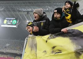 Children cheerleaders in the stands