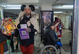 Caricature artists congratulate people on Christmas in Kharkiv