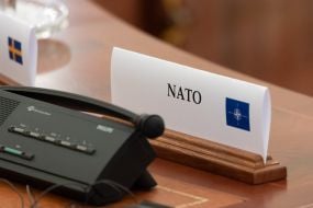 A sign with the inscription NATO