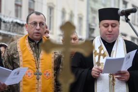 Clergymen of different denominations and military chaplains during joint prayer
